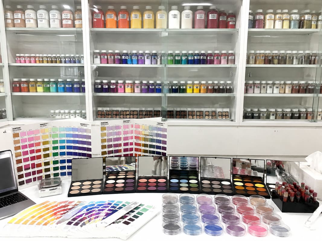 Sample room with walls of color swatches and finished product samples